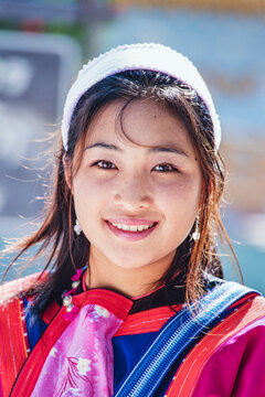 Close-up portrait of a Lisu Hill Tribe Woman in traditional dress; Mae Hong Son, Thailand