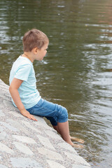 A little romance on a stony river bank in the city.