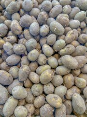 Fresh potato display on the shelf at supermarket.this photo was taken from Bangladesh.