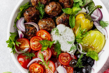Greek meatballs with tzatziki sauce.