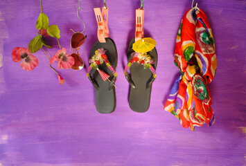 summer and vacation still life with flip flops,sunglasses,flowers,multicolored shawl,free copy space - 763398877