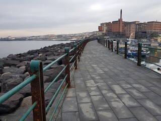 A view of the port of Naples from the promenade. - obrazy, fototapety, plakaty