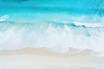 Aerial background of a pristine beach with powdery white sand