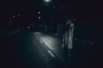 Horror woman concept,Ghost on the road in the city,A vengeful spirit on the street of the town,Halloween festival,Make up ghost face - obrazy, fototapety, plakaty