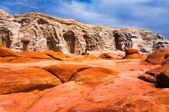 Eroded cliffs of bright red and pink sandstone at The Toadstools, Grand Staircase-Escalante National Monument, near Kanab, Utah