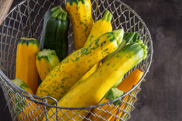 Yellow green leopard spotted zucchini. Vegetables on the table. vegetable marrow harvest. Food...
