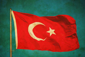 Grunge image of Turkish flag waving in the sky..