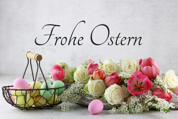 Grußkarte Frohe Ostern: Ostereier mit Blumenl mit dem Ostergruß Frohe Ostern.