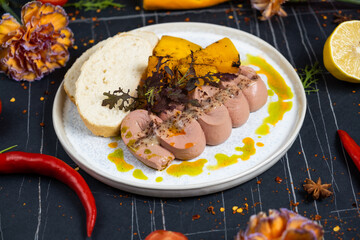 Toasts with Duck pate Rillettes de Canard on wooden board. Dark wooden background. Top View