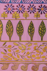 Ancient floral pattern with leaves, olives and flowers. The dabbing technique near the edges gives a soft focus effect due to the altered surface roughness of the paper. - 763423235