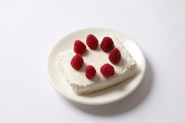 Сottage cheese with berries in a plate