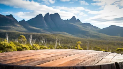 Foto op Plexiglas Cradle Mountain The empty wooden brown table top with blur background of Cradle mountain in Tasmania. Exuberant image. generative AI