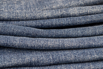 details of clothes made of blue denim soft fabric