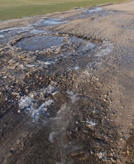 broken ice on the highway in winter season