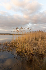 beautiful sunset on the lake with reflection in the water