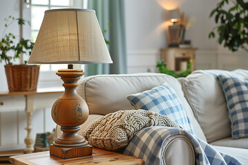 rustic lamp on an end table near the sofa in Scandinavian interior style