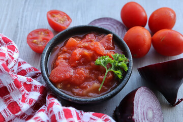 Tomato and onion mix. Usually used as a base for cooking curries or pastas 