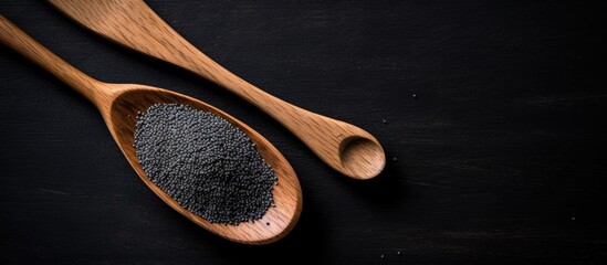Wooden spoons with black sesame seeds