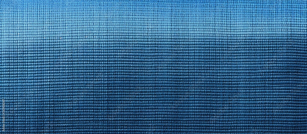 Poster close up of blue fabric with intricate pattern