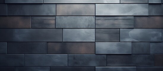 Close up of black wall with metal tile pattern