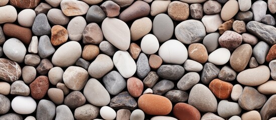 Close up view of assorted rocks, including a red and white one
