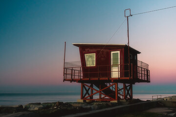 Lifeguard tower on the Black Sea coast. Big red lifeguard tower.