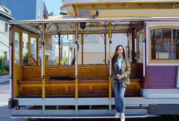 woman in front of a tram