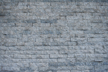 Grey stone brick wall background texture