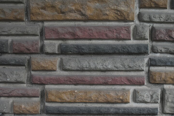 Coloured brick wall background texture