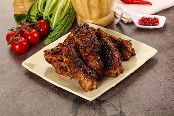 Grilled pork ribs in barbecue sauce