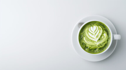 Cup of green Japanese matcha latte with latte art, warm drink