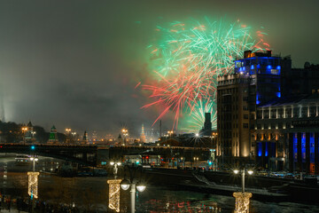 New Year fireworks over the river at night in Moscow