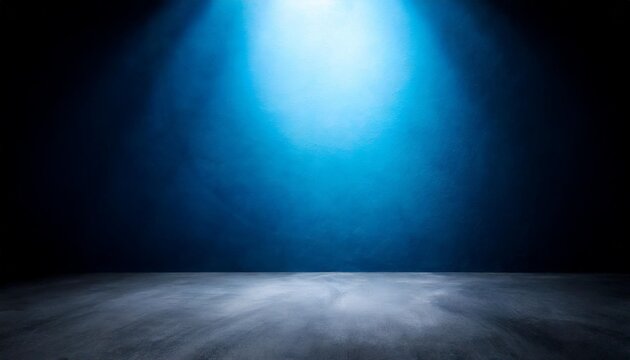 empty dark blue studio background and grey floor concrete perspective with blue soft light well editing floor display product and text present on wall room empty free space black cement backdrop photo