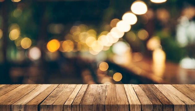 wood table top bar with blur light bokeh in dark night cafe restaurant background lifestyle and celebration concepts