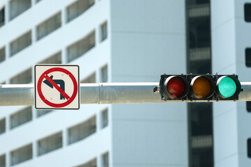 Overhead traffic lights high above street in Miami, Florida