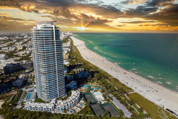 Popular vacation spot in the United States. Ocean warm waters and sandy beachfront at Miami Beach...