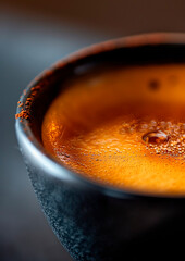 Close-up of an hot espresso cup