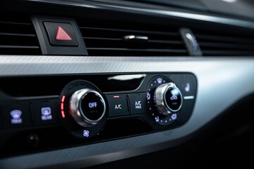 Air conditioning control panel in car. Car interior