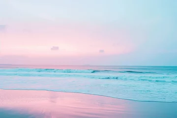 Fototapeten Calm waves and soft pink hues paint a tranquil tropical beach scene at twilight © Adrian