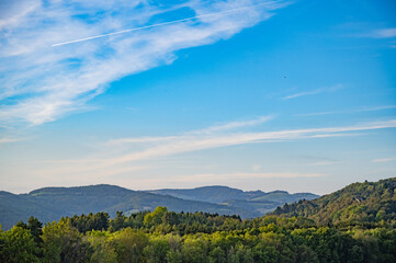 Fototapeta premium beautiful landscape of Austrian nature in Burgendand. Hills with forest and beautiful sky