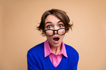 Photo portrait of pretty young girl open mouth amazed reaction wear trendy blue outfit isolated on...