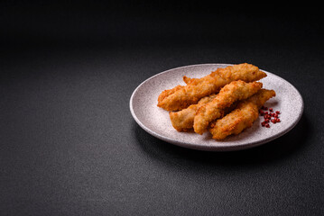 Delicious fresh chicken or turkey strips or nuggets breaded with salt and spices