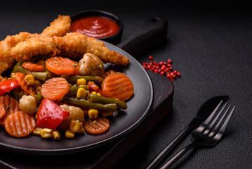 Delicious healthy vegetables steamed carrots, broccoli, asparagus beans and peppers