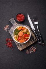 Delicious healthy vegetables steamed carrots, broccoli, asparagus beans and peppers