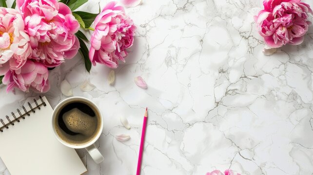 a coffee mug, empty notepad, pencil, and vibrant pink peony flowers adorning a pristine white stone table, tailored for a women's workspace.