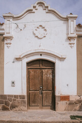 Fototapeta na wymiar old colonial door in tilcara, argentina