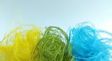 Colorful threads on a white background close-up. Selective focus.