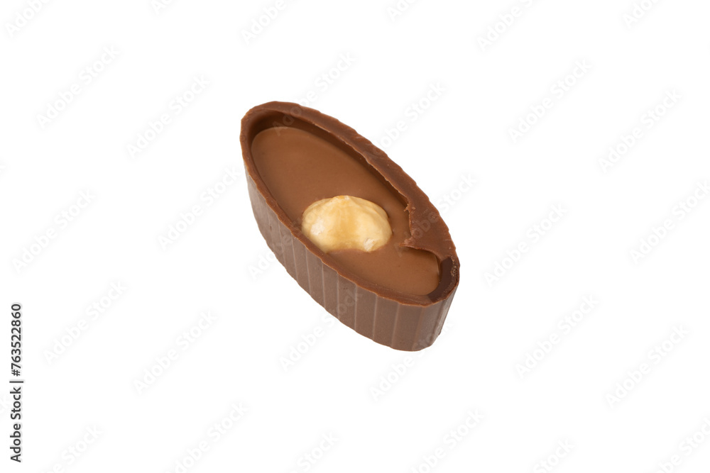 Wall mural Chocolate candy with a nut isolated on a white background.