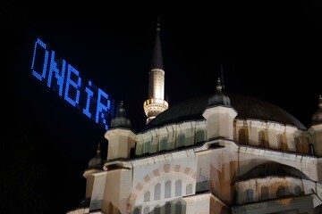 A large big mosque with a blue sign