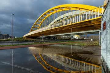 Fototapeten Utrecht, the Netherlands. 26 December 2023. Hogeweidebrug (Gele brug), a bridge from 2008, it crosses the Amsterdam-Rijnkanaal, Utrecht © PixelBiss